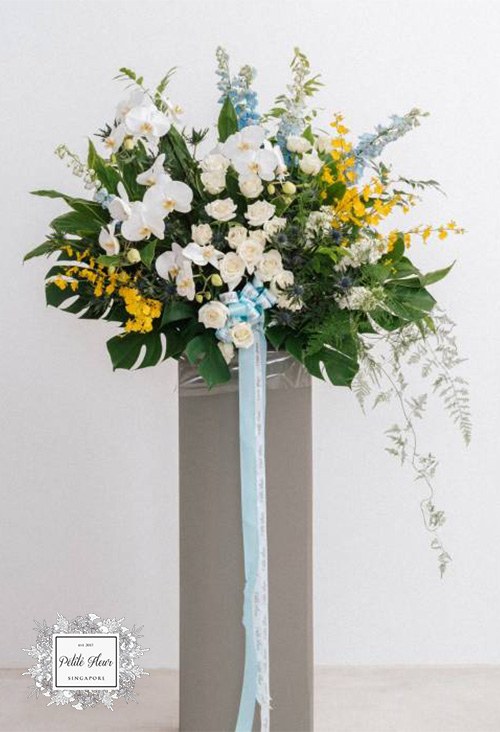 Lush Delphinium And Orchid Floral Stand